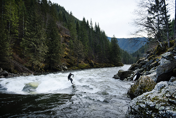Kevin Benhardt rides the spring runoff on Pipeline, one of the more consistent surfing waves on the Lochsaw River in Idaho; Photograph by Max Lowe